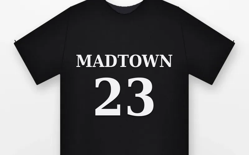Black t-shirt with white heat transfer vinyl lettering reading MADTOWN 23
